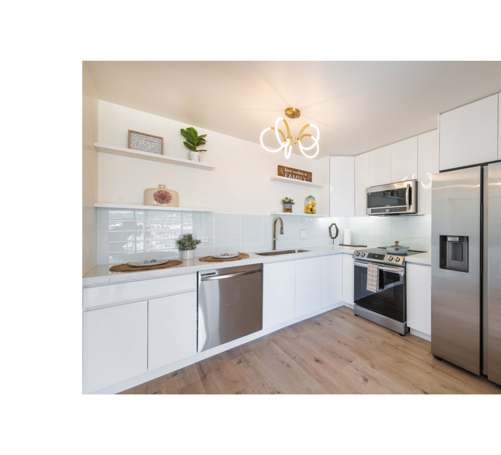 Modern Elegance: White Cabinets, Black-Silver Appliances, and Light Wood Floors for a Fresh Look