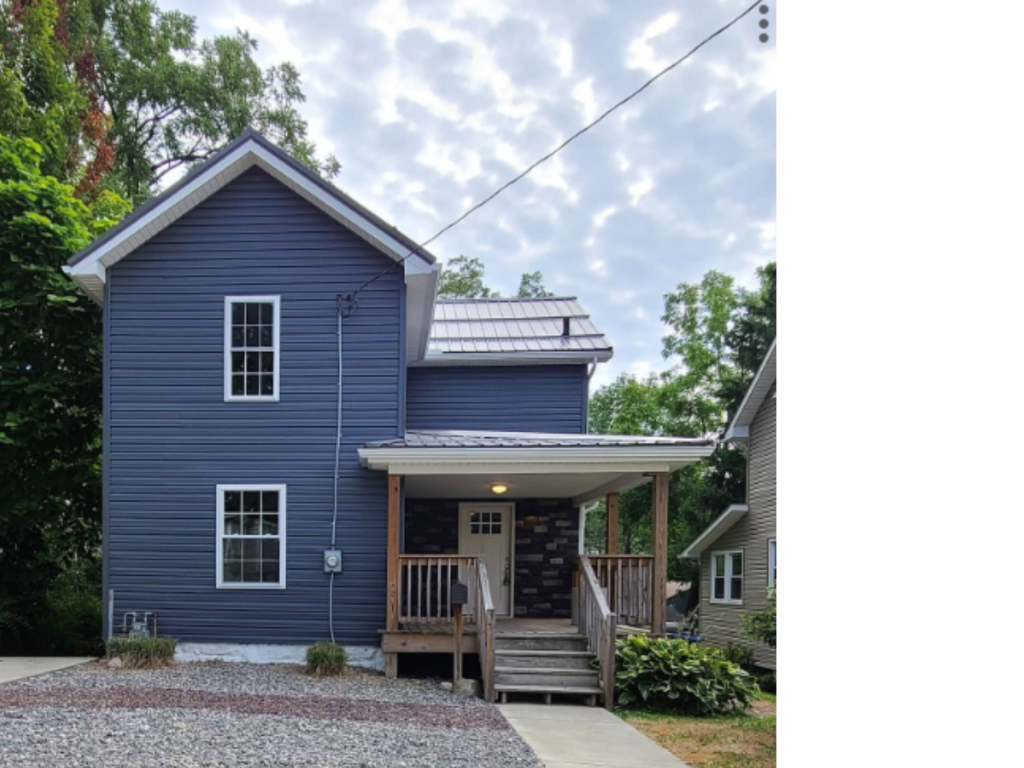 Cozy Two-Story Home: Modern Updates, Welcoming Porch
