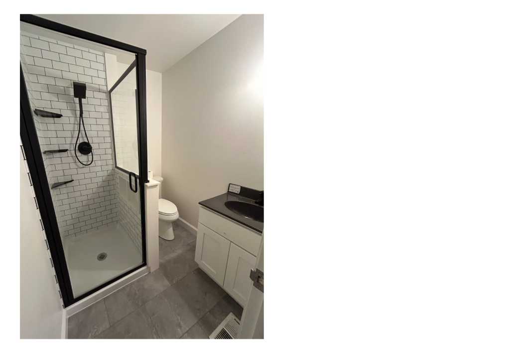 Modern Refresh: Sleek Black Accents Define This Bright Bathroom