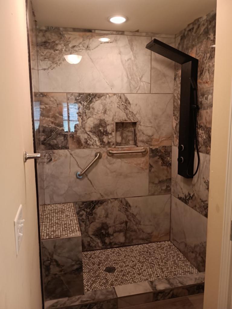 Elevate Luxury with a Marble Bathroom Remodel in Brown, Black & Gray Tones